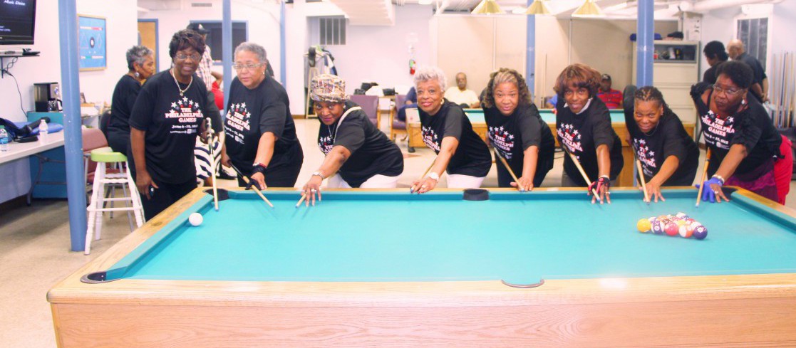 Women playing billiards